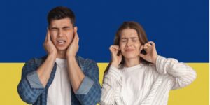 stop war ukrainian couple covering ears plugging with fingers picture id1384845104